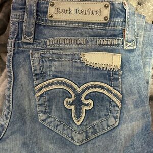 Rock Revival Faded Blue Jeans with Embroidered Pocket